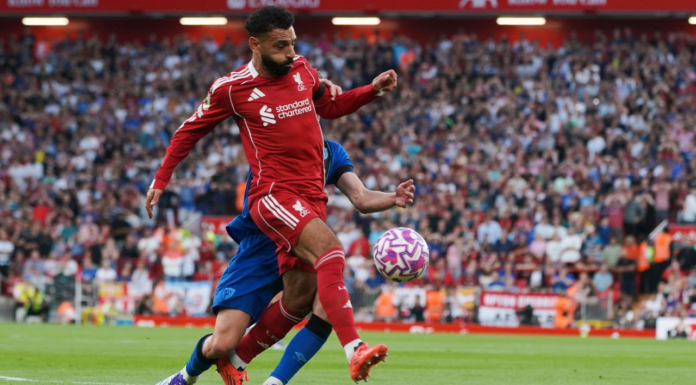 Late goals, Jota tributes, racism claim as Liverpool wins Premier League opener