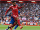 Late goals, Jota tributes, racism claim as Liverpool wins Premier League opener