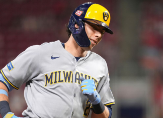 MLB-best Brewers rally past Reds, tie club record with 13th straight win
