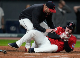 Guardians’ Fry carted off field after being hit in face by pitch during bunt