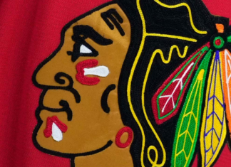 Blackhawks, former player settle lawsuit