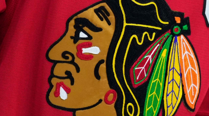 Blackhawks, former player settle lawsuit