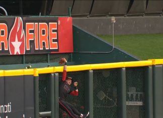 Reds’ Friedl gets up over the fence for home-run robbery