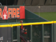 Reds’ Friedl gets up over the fence for home-run robbery