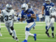 Taylor runs for three TDs, Jones throws for two as Colts rout Raiders