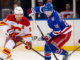 Alexis Lafreniere’s hat trick leads Rangers over Flames