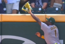Denzel Clarke leaps the fence to steal home run away from Braves’ Baldwin