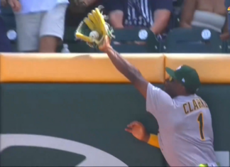 Denzel Clarke leaps the fence to steal home run away from Braves’ Baldwin