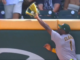 Denzel Clarke leaps the fence to steal home run away from Braves’ Baldwin