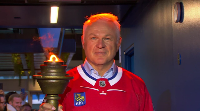 Claude Lemieux carries out torch to electric Canadiens crowd before Game 3