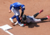 Okamoto shakes off HBP to power Blue Jays to tense win over Marlins